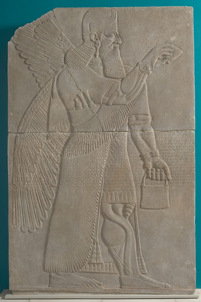 Relief panel carved with a winged spirit holding a jug in one hand.