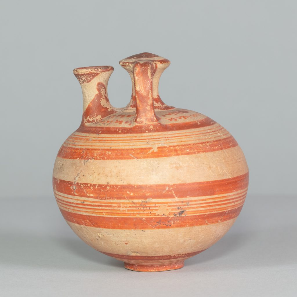 Alternate view of Spherical, white-and-red striped vase with two handles and a small spout.