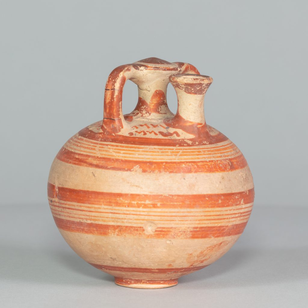 Spherical, white-and-red striped vase with two handles and a small spout.