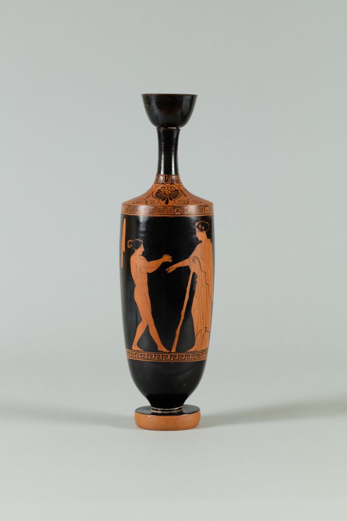 Alternate view of Tall, black terracotta flask with a red figure and scroll trim.