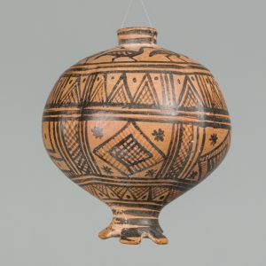Alternate view of Pomegranate-shaped orange vase with painted black patterns and birds.