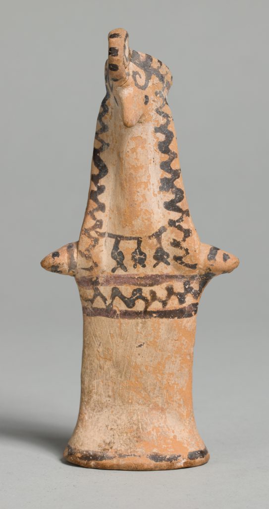 Orange terracotta statue of figure with bird-like head, trimmed with black painted patterns.