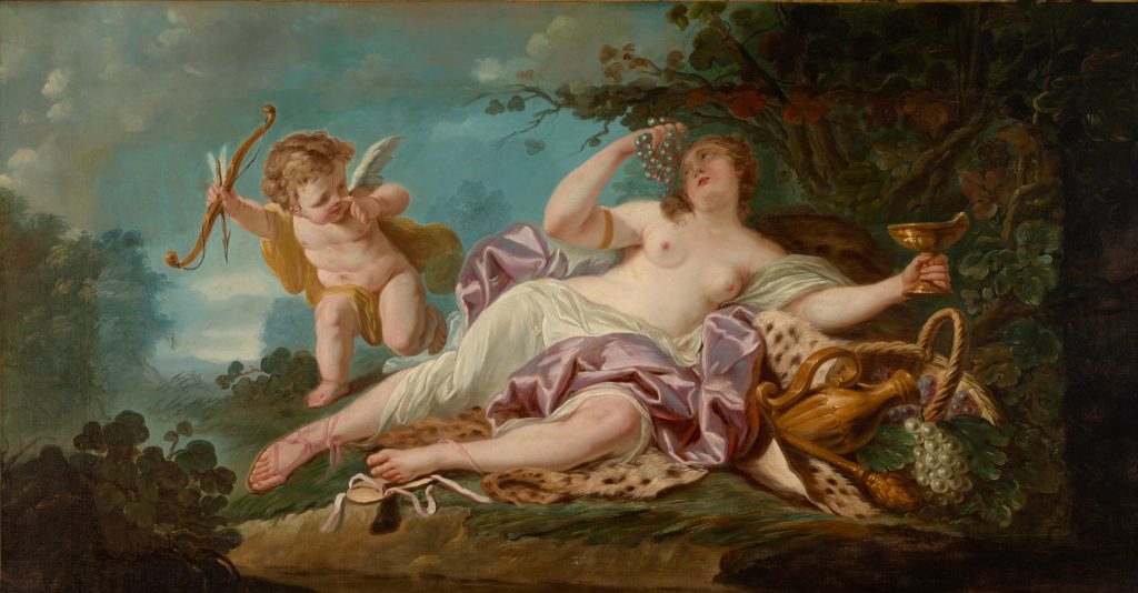 Painting of a nude woman draped in satin sheets lounging under a tree. She holds a chalice and feeds herself grapes while a cherub frolics nearby.