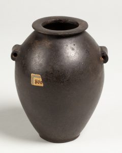 Alternate view of Smooth black jar with two lug handles.