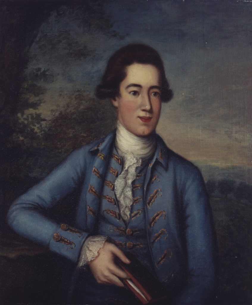 Portrait of a young James Bowdoin III wearting a blue suit, holding his finger in a book.